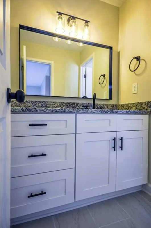 Tiled tub and shower surround with a window